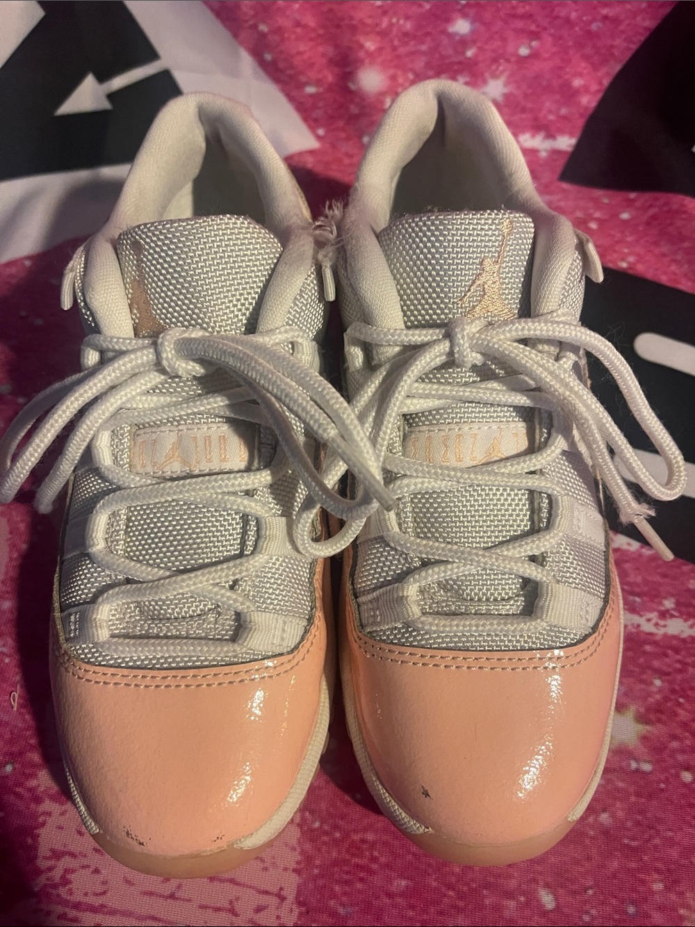 Kids Jordan 11 White and Light Pink Athletic Sneakers